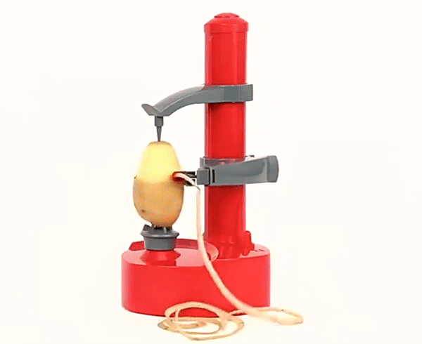 Red Fitlybuy SmartPeel automatic electric peeler removing the skin from a potato on a white background.