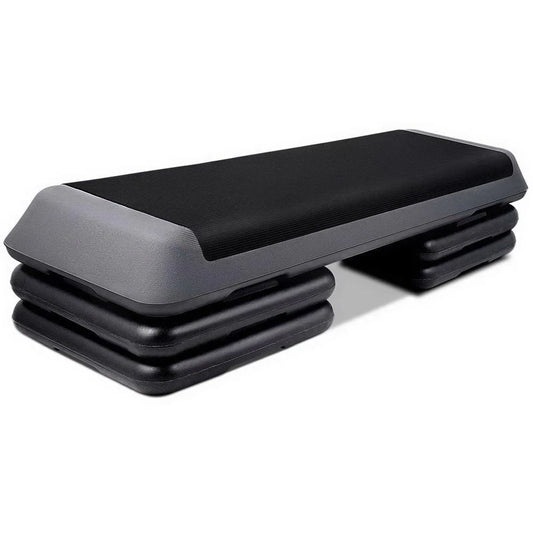 Black and grey 110cm aerobic exercise stepper with an anti-slip textured surface and 3-level adjustable height.