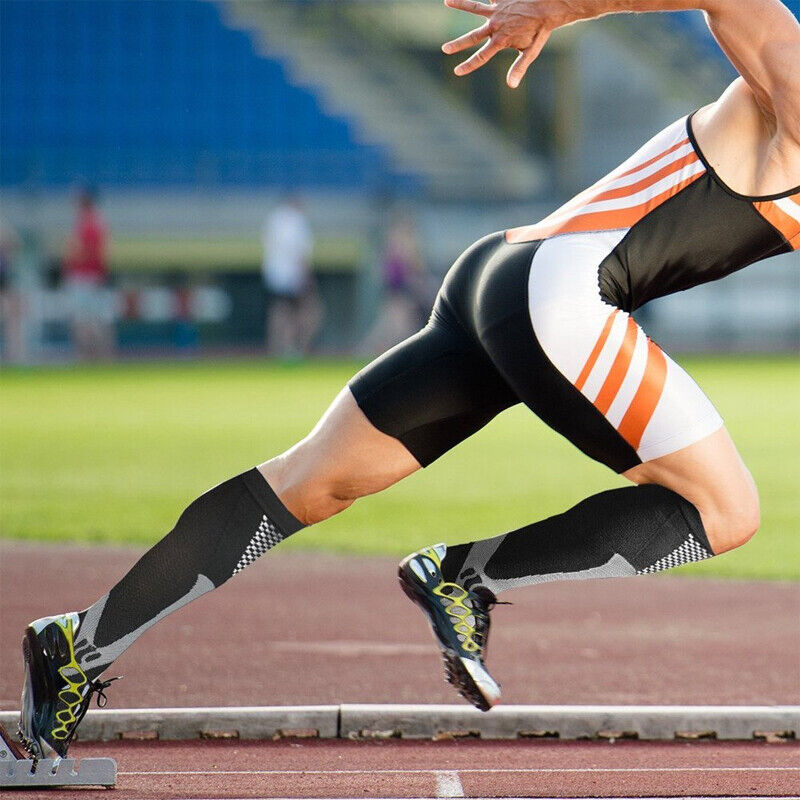 Athlete wearing black Fitlybuy Easy Legs compression socks on a track, showcasing advanced circulation support design.