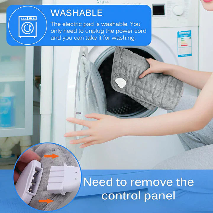 Grey plush Fitlybuy heated therapy pad being placed into a washing machine, showing the detachable control connector.
