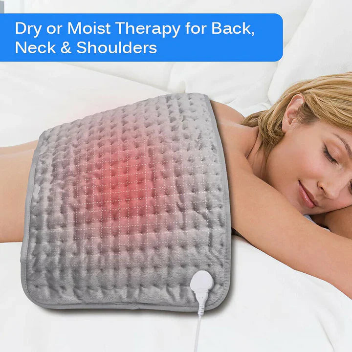Grey Fitlybuy heated therapy pad on a person's back, providing dry or moist heat relief for muscles.