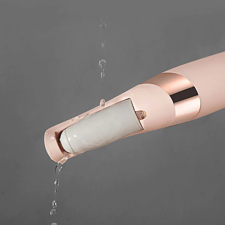 Fitlybuy electric foot grinder in pink with rose gold accents, featuring a waterproof design with water dripping off it.