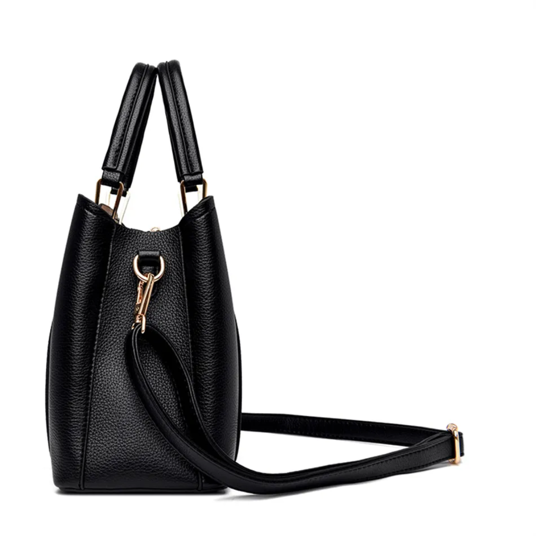 Black textured PU leather Fitlybuy Vivian shoulder bag with gold hardware and a detachable crossbody strap on white.