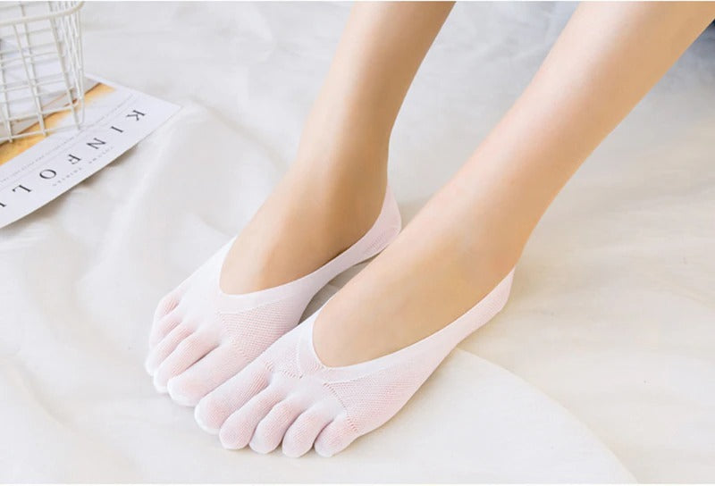 A pair of white Fitlybuy compression toe socks with mesh detailing, worn on feet against a white fabric background.